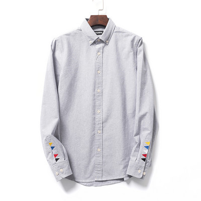 Meeste särk värvilise tikandiga varrukal