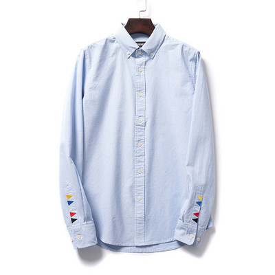 Meeste särk värvilise tikandiga varrukal