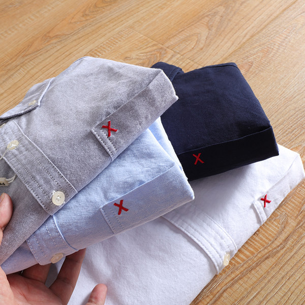 Meeste särk tikandiga krael ja pikkade varrukatega