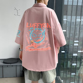 Suvine lai värvilise aplikatsiooniga särk seljal