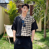 Klassikalise krae ja lühikeste varrukatega meeste ruuduline särk