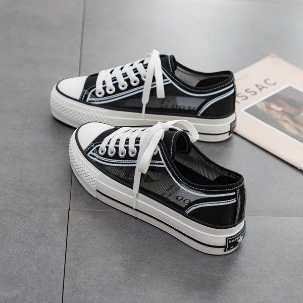 Ženske tenisice sa prozirnim dijelovima i amblemom