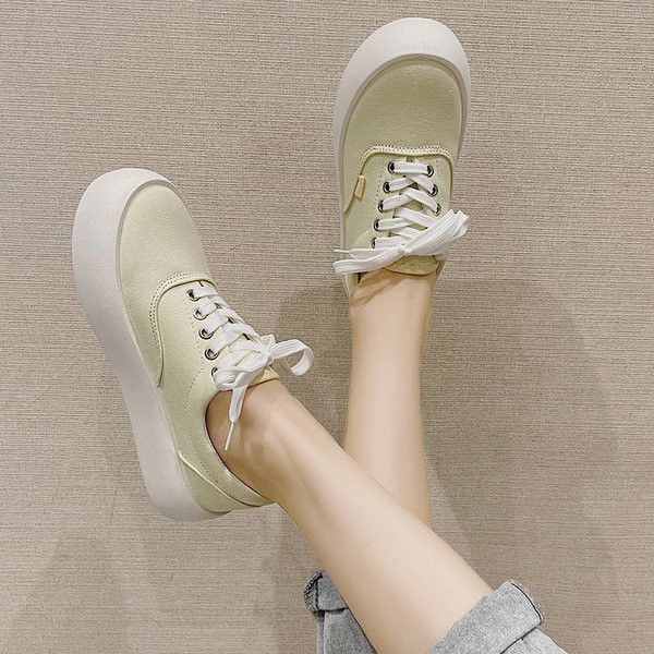 Naiste ühevärvilised tasase talla ja paeltega tossud