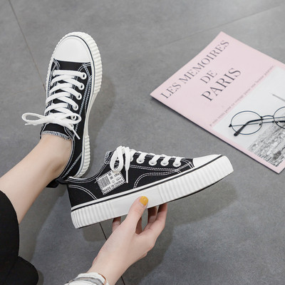 Ženske ležerne tenisice s grbom i kravatama