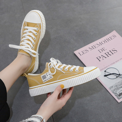 Ženske ležerne tenisice s grbom i kravatama