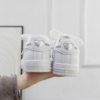 Paelte ja südameaplikatsiooniga naiste tossud