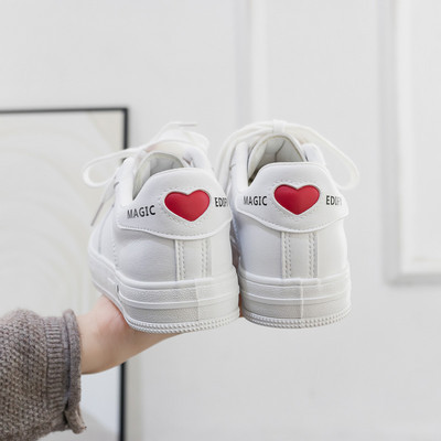 Paelte ja südameaplikatsiooniga naiste tossud