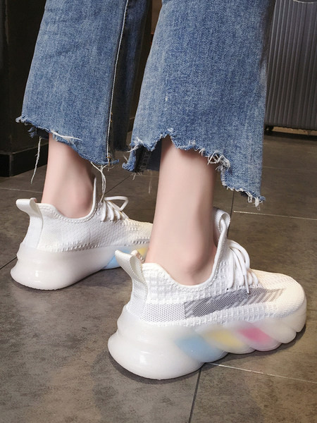 Naiste tekstiilist värvilise tallaga tossud