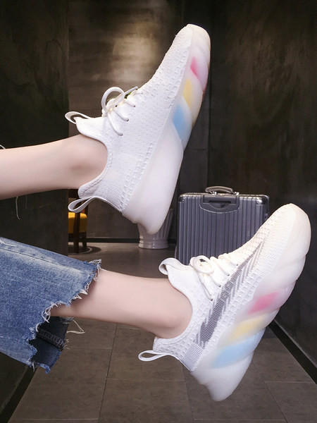 Naiste tekstiilist värvilise tallaga tossud