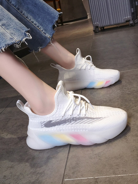 Naiste tekstiilist värvilise tallaga tossud