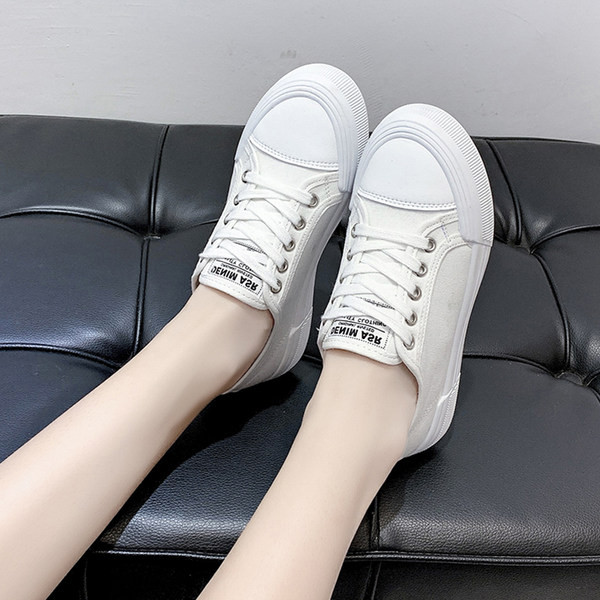 Ženske platnene tenisice sa grbom i vezicama