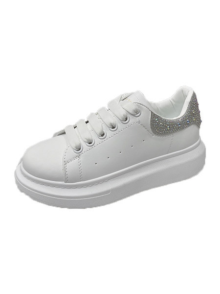 Jauns sieviešu kedu modelis ar izšuvumu un plakanu zoli