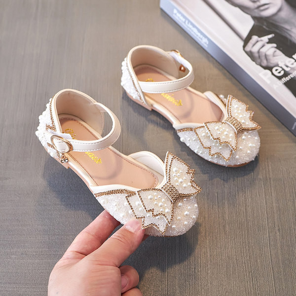 Jauns bērnu sandaļu modelis ar lentīti un pērlēm
