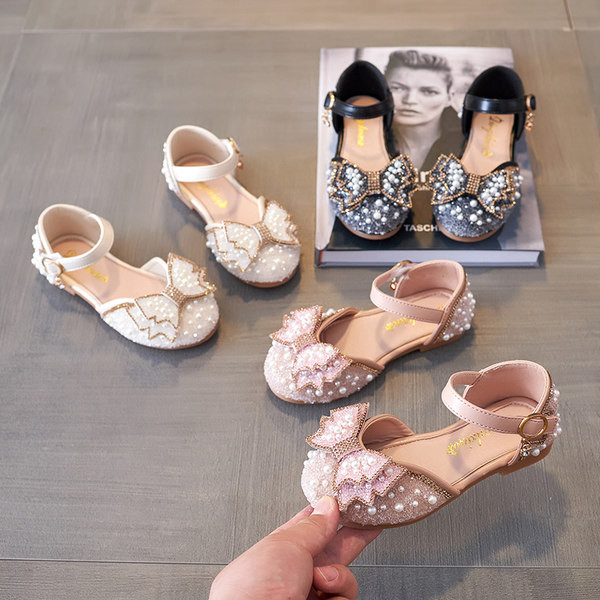 Jauns bērnu sandaļu modelis ar lentīti un pērlēm