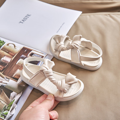 Laste kunstnahast takjapaelaga sandaalid