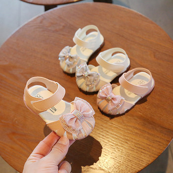Παιδικά παπούτσια με κορδέλα και διακοσμητικές πέτρες σε ροζ και λευκό χρώμα