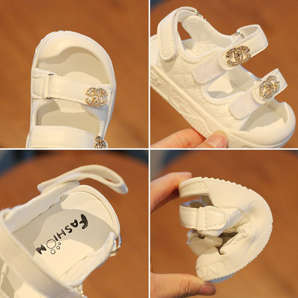 Kleebiste ja metallist kaunistusega laste kunstnahast sandaalid