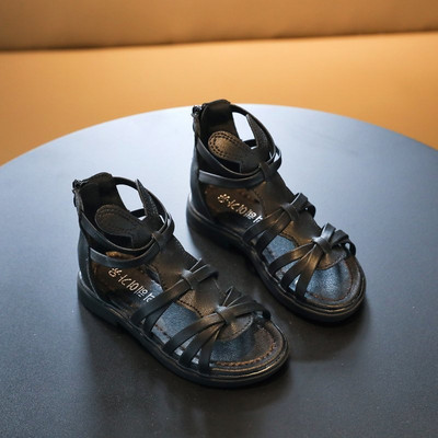 Jauns mākslīgās ādas sandaļu modelis ar rāvējslēdzēju romiešu stilā