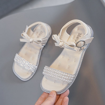 Παιδικά σανδάλια με πέρλες και κορδέλα