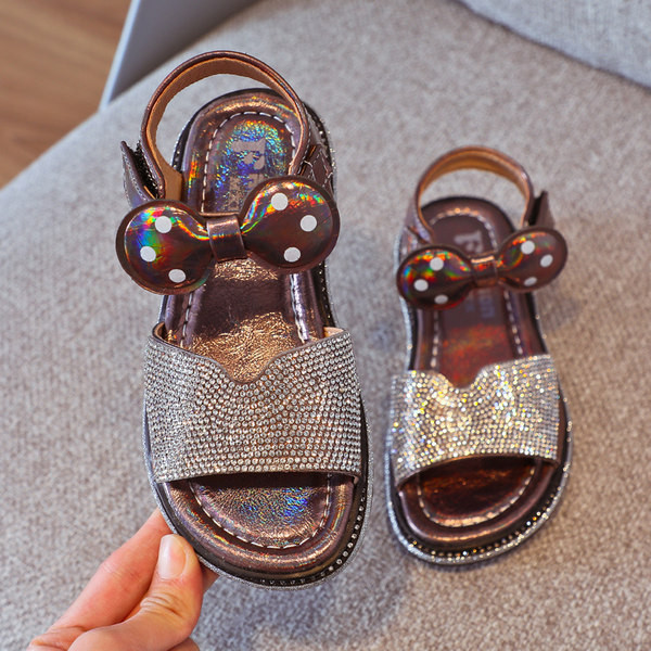 Παιδικά γυαλιστερά σανδάλια με κορδέλα και velcro