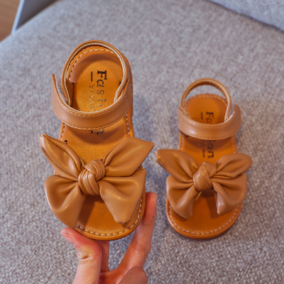 Nahast paela ja lameda tallaga laste sandaalid