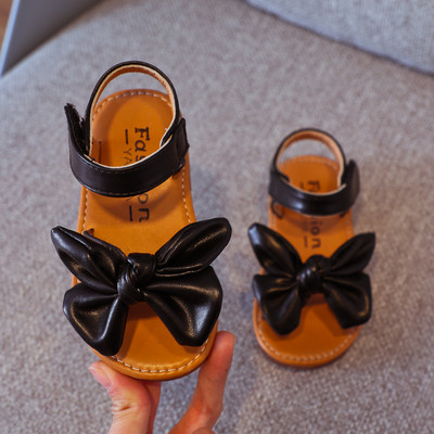 Nahast paela ja lameda tallaga laste sandaalid