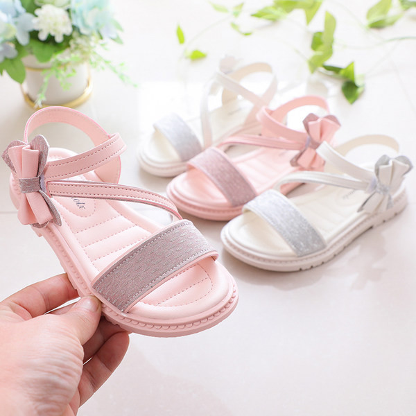 Moodsad kunstnahast paelaga laste sandaalid - tüdrukutele