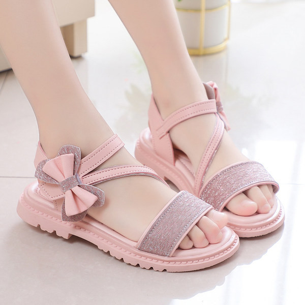 Moodsad kunstnahast paelaga laste sandaalid - tüdrukutele