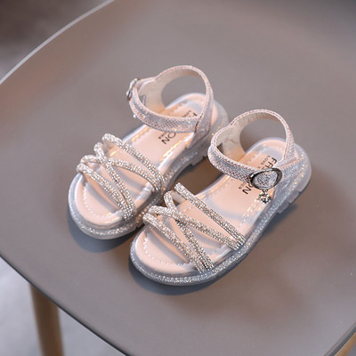 Eko-nahast dekoratiivkivide ja pandlaga laste sandaalid