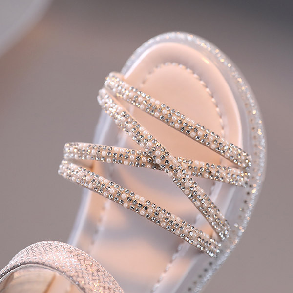 Eko-nahast dekoratiivkivide ja pandlaga laste sandaalid