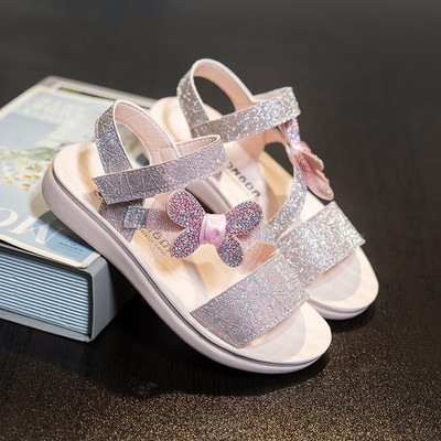 Brokaadi ja paelaga laste sandaalid