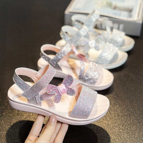 Brokaadi ja paelaga laste sandaalid