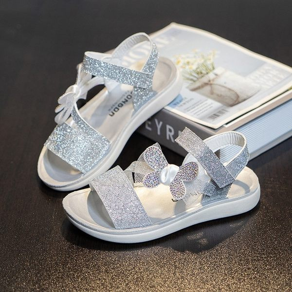 Brokaadi ja paelaga laste sandaalid