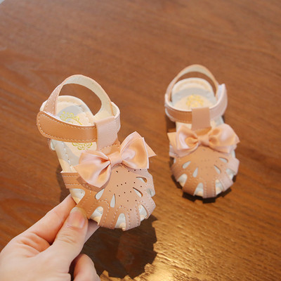 Kahes värvitoonis paelaga nahast laste sandaalid