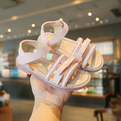 Laste kunstnahast paelaga sandaalid