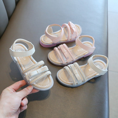 Laste kunstnahast paelaga sandaalid