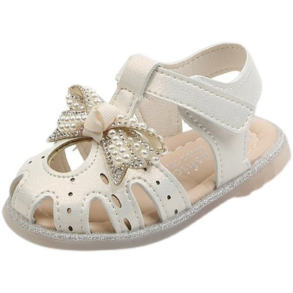Παιδικά σανδάλια με επίπεδη σόλα και κορδέλα