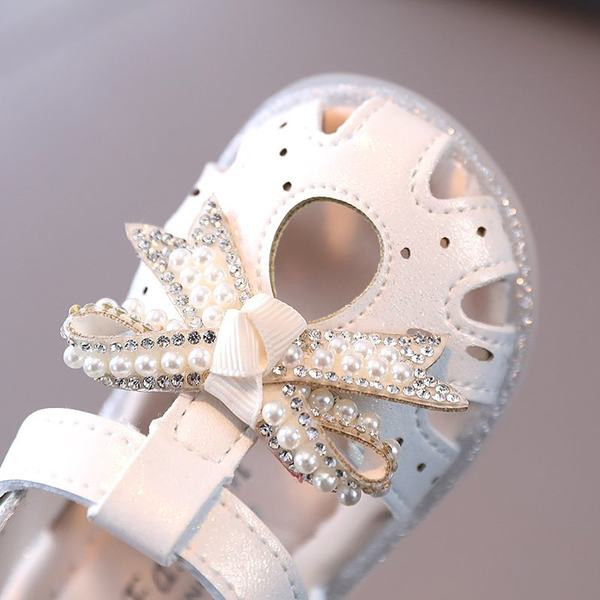 Παιδικά σανδάλια με επίπεδη σόλα και κορδέλα