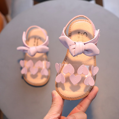 Laste nahast sandaalid lameda talla ja plaastritega