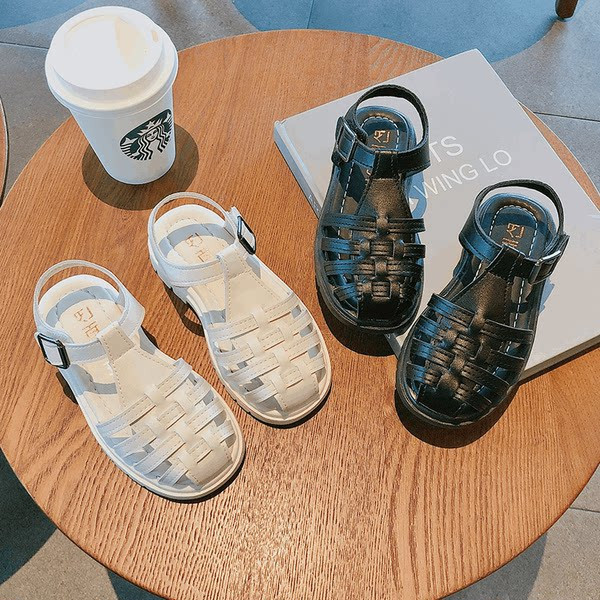 Bērnu ādas sandales melnā un baltā krāsā