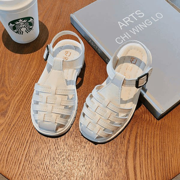 Bērnu ādas sandales melnā un baltā krāsā