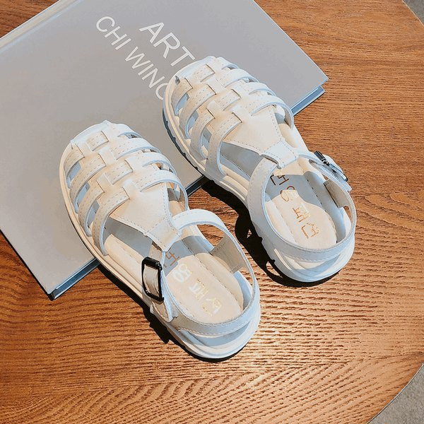 Bērnu ādas sandales melnā un baltā krāsā