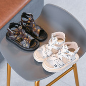 Tüdrukutele sobivad valged ja mustad laste sandaalid