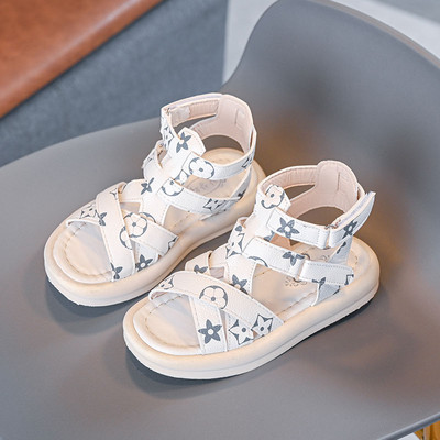 Tüdrukutele sobivad valged ja mustad laste sandaalid