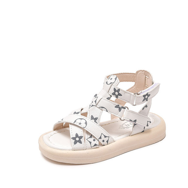 Tüdrukutele sobivad valged ja mustad laste sandaalid