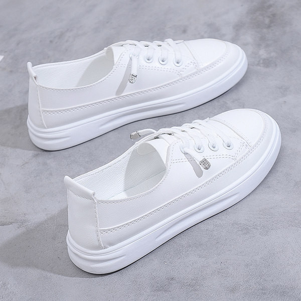 Sieviešu kedas ar plakanām zolēm un šņorēm - tīrs modelis