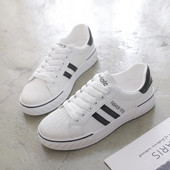 Ženske tenisice u bijeloj boji sa vezicama i ravnim đonom - pogodne za ljeto