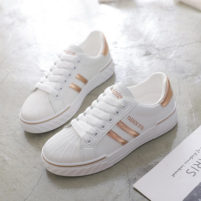 Ženske tenisice u bijeloj boji sa vezicama i ravnim đonom - pogodne za ljeto