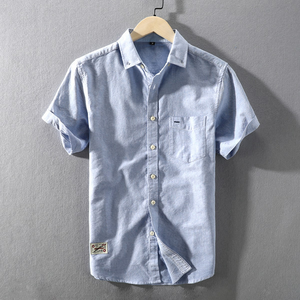 Памучна едноцветна риза с къс ръкав и копчета