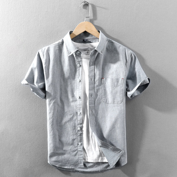 Памучна едноцветна риза с къс ръкав и копчета